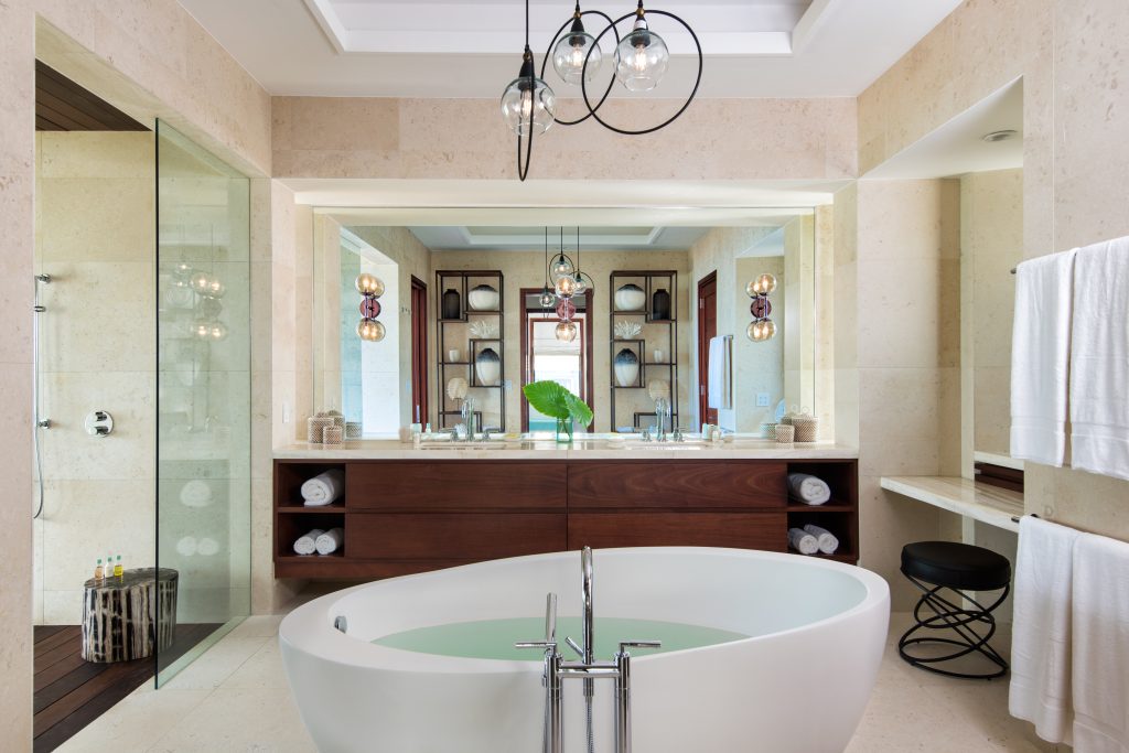 Bathroom with a freestanding bath at Hawksbill Tennis Estate