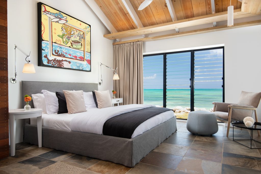 Bedroom with ocean view at Silver Sands Padel Villa