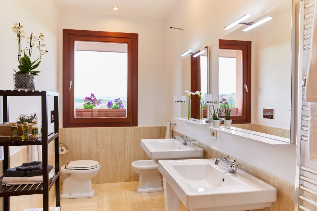 Bathroom with a double vanity at La Sabina Tennis Estate