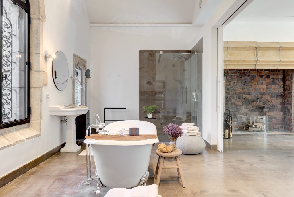 Le Castel bedroom bathroom with freestanding bath