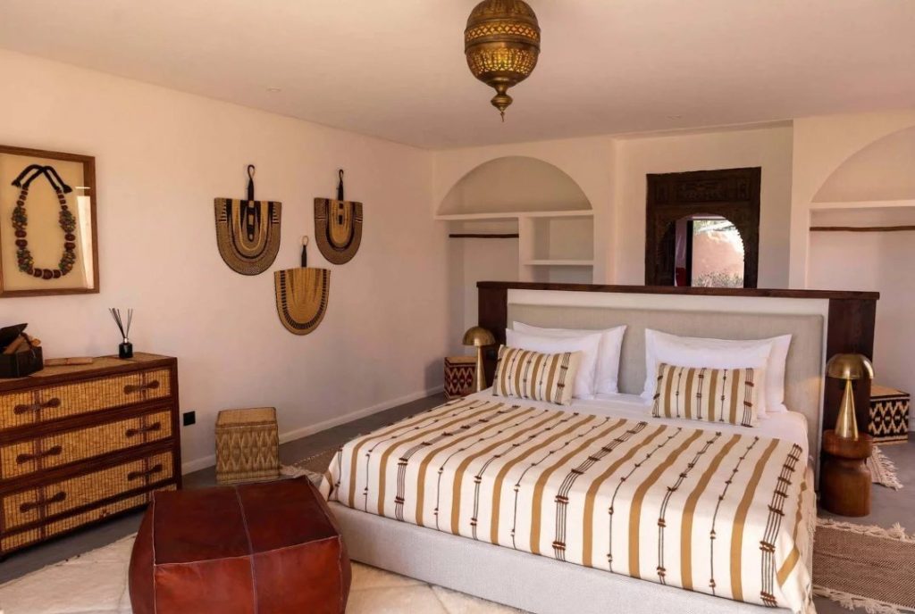 Bedroom with a patterned bedspread at Villa Nara