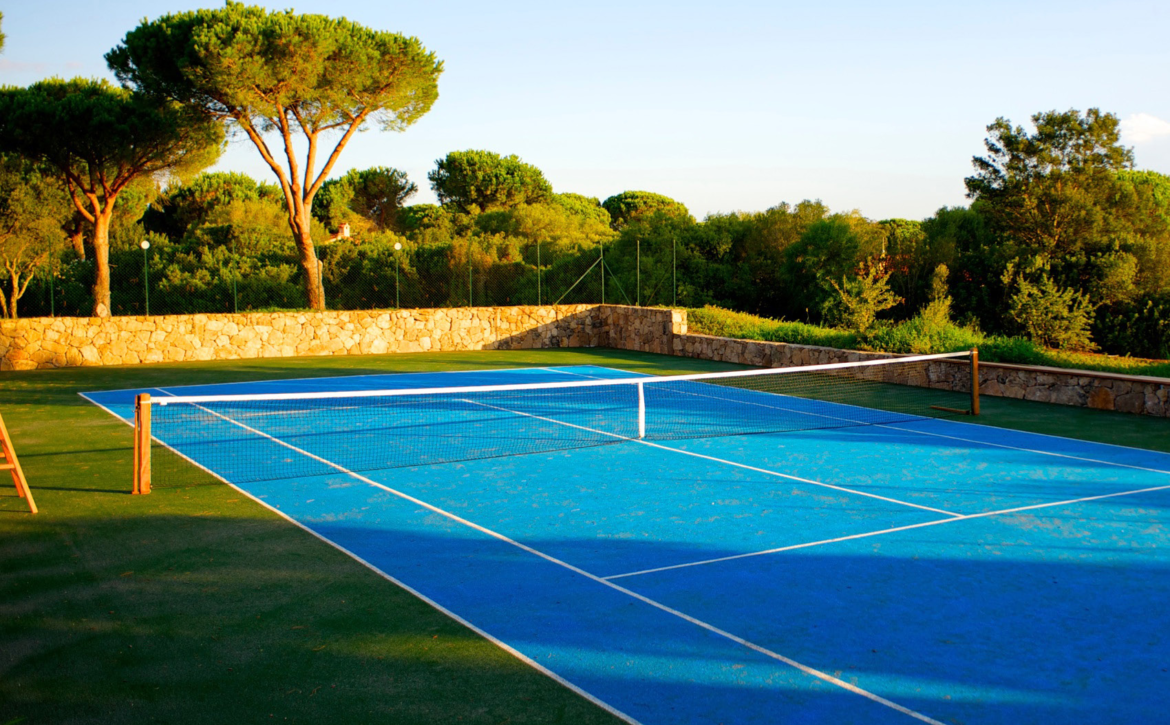 Private tennis court at Villa H2O, a home with a private court for rent in San Teodoro, Sardinia