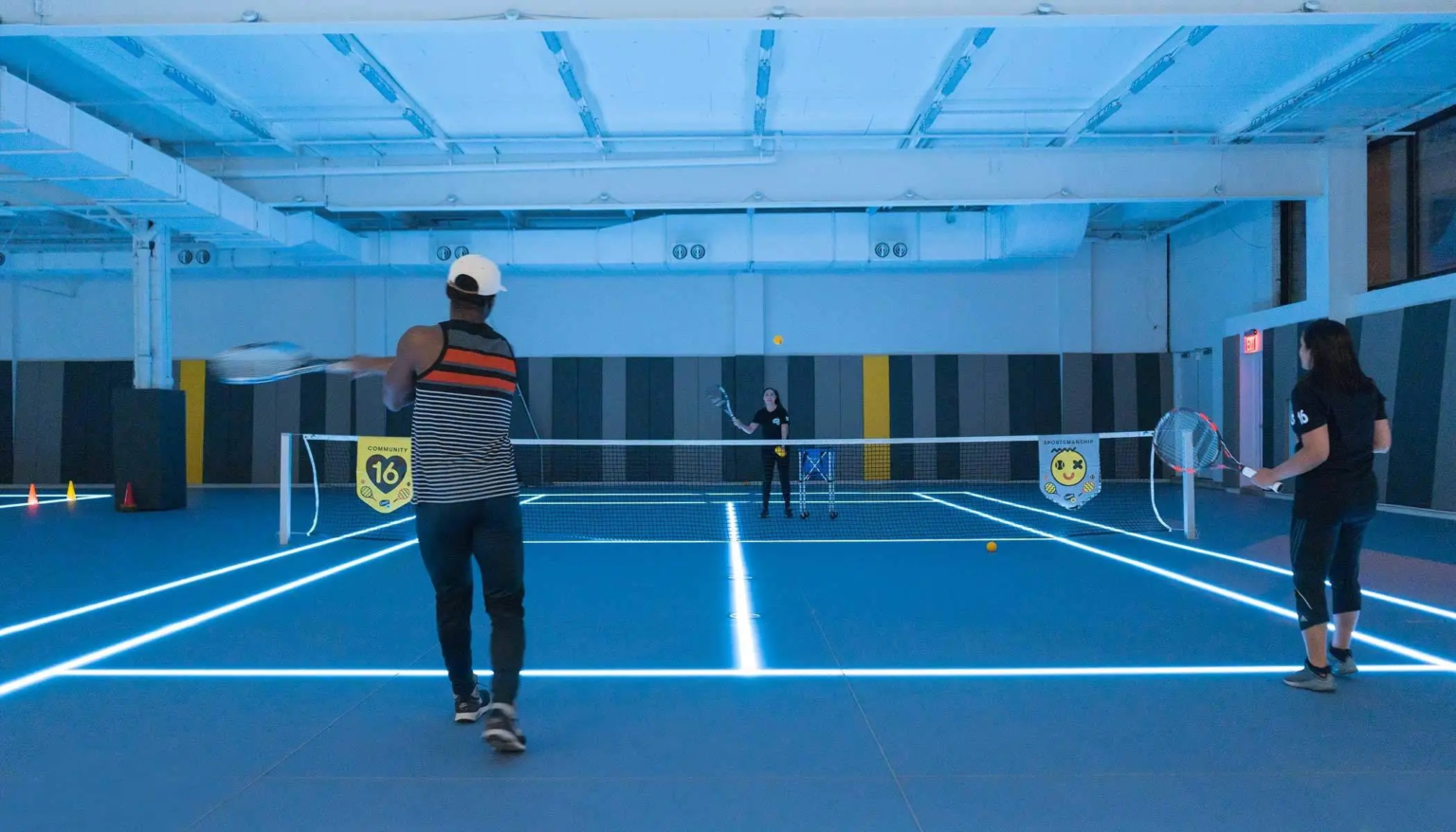 LED lines lit beneath the glass floor at Court 16, Long Island City